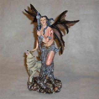 Male Fairy with Wolf and Staff Figurine