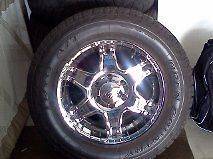 TOYO OPEN COUNTRY TIRES AND CHROME RIMS