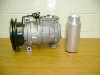 BRAND NEW AC COMPRESSOR & DRIER KIT 10379T PLEASE INCLUDE MODEL YEAR 