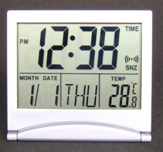   travel alarm clock, count down timer, desktop, calendar, thermometer