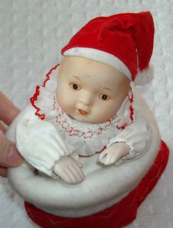 Porcelain Baby Doll Red Xmas Stocking Animated Music Its a Small World 