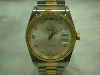 RARE BULOVA SUPER SEVILLE 18KGP/STAINLESS STEEL COINRIMMED AUTOMATIC 