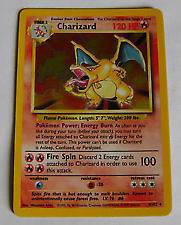 Charizard holographic holo Pokemon Card. RARE. 4/102 Good Condition W 