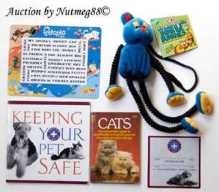 LOT OF PET SUPPLIES ~NEW BUNGIE CORD CAT TOY, DOG/CAT BOOKS 