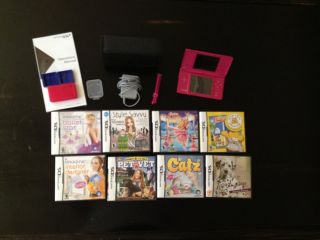 Nintendo DSi Pink Handheld System with 8 games and accessories