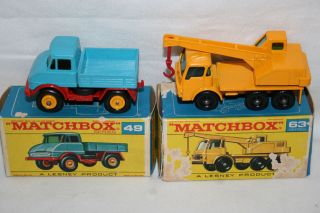 Matchbox Set of 2 includes Dodge Crane Truck No. 63 and Unimog No. 49
