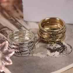 Set of Four Meaningful Word Stacking Rings Live Love Dance Sing