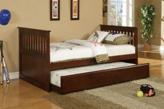 TWIN ESPRESSO TRUNDLE BED . TOP AND BOTTOM WITH SLATS .VERY NICE 