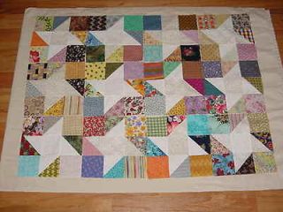 Set of 12 nine inch mixed print Star quilt blocks