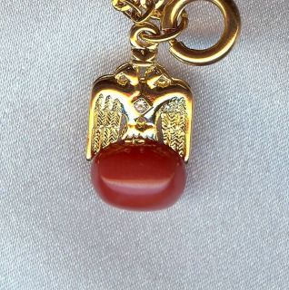 Joan Rivers Charm Goldtone Double Eagle Atop Coral Oval Plus Extender 