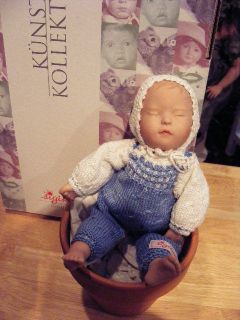Sigikid baby in flower pot made in Germany (blue)