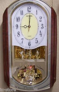 Guten Quartz Oblong Rotating Musical Melody Pendulum Wall Clock 