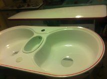 Vintage porcelain country kitchen sink   white with red trim and 
