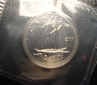   10 cent coin in the original Royal Canadian Mint cellophane wrapper