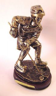 bronze tone resin figurine statue quebec hockey player from canada