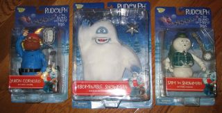   Yukon Cornelius, the Abominable Snowman & Sam the Snowman. The figures