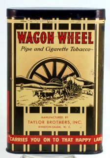 WAGON WHEEL TOBACCO TIN   TALL NOT THE SAMPLE   GOOD CONDITION 