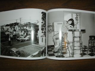   very interesting and wide ranging collection of Araki images
