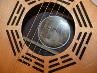 the zen feaures an inlaid rosewood bagua at the soundhole