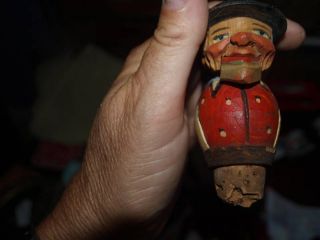 antique carved wood mechanical man cork bottle stopper time left