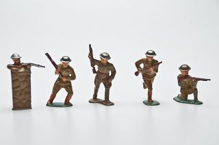 up for sale are 5 barclay manoil soldiers with rifles made around 1940 