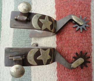   marked cowboy spurs these spurs have the moons and star beason