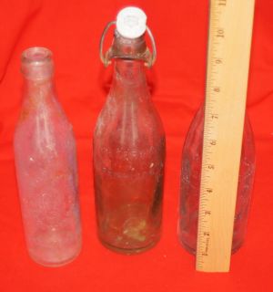 Three Old Glass Bottles