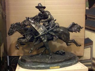 The Wounded Bunkie Solid Bronze Fredrick Remington