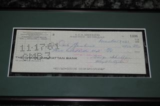 We are listing a Framed & Matted Carlo Gambino Signed Check You 