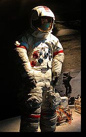 At left is Cernans actual suit, as it appears on display at the 