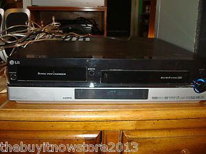 LG SURROUND SOUND SYSTEM lhx 557 5 DISC DVD CD AND VHS PLAYER SYSTEM