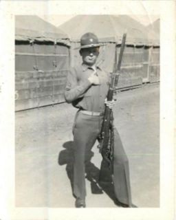 Circa 1950s Macho Military Man with Rifle Snapshot