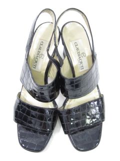 you are bidding on a pair of claudia ciuti black patent moc croc heels