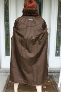  on a beautiful demi buff mink fur coat in excellent condition made