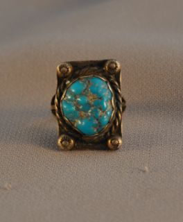 the ring has a deep silver patina from age but could be polished to