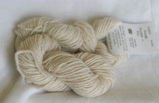  72% wool single ply worsted weight yarn. The color is Dough (PS100