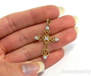 this lovely estate filigree cross pendant is crafted in solid 10k