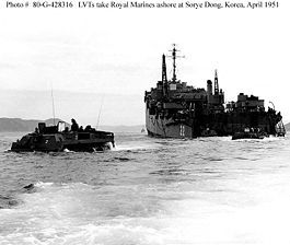 LVTs embarking British commandos leave Fort Marion for the beach at