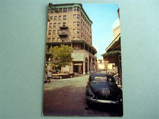 Basin Park Hotel EUREKA SPRINGS ARKANSAS Postcard OLD CARS SIGN