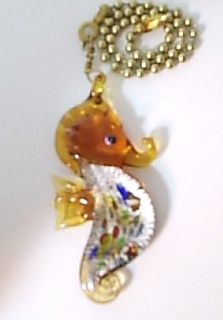 fan pull light chain amber lampworked glass seahorse