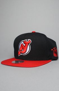 Mitchell & Ness The NHL Wool Snapback Hat in Black Red