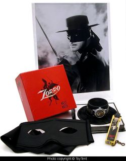  of Zorro wrist watch with box & stand + mask, flippo flashlight, photo