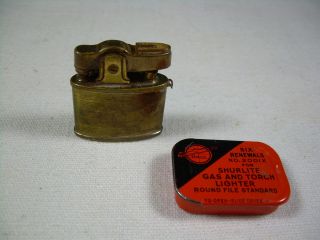 Brass Cigarette Lighter with Tin of Renewals Shurlite