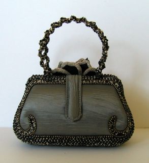 MARY FRANCES gorgeous beaded frame evening handbag. Features bead