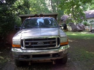 1999 Ford F550 XL 4x4 Dump Truck with Plow