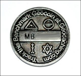 Four Corners Benchmark Micro Geocoin. Trackable, Unactivated