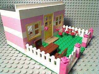  female house girl city bungalow flower rose garden white picket fence