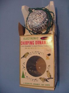Grants Chirping Bird Sound Silver Ball Ornament