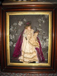 antique early madonna statue in deep shadow box frame time