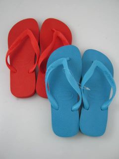  on a pair of lot 2 new havaianas kids red blue flip flops in a size 4